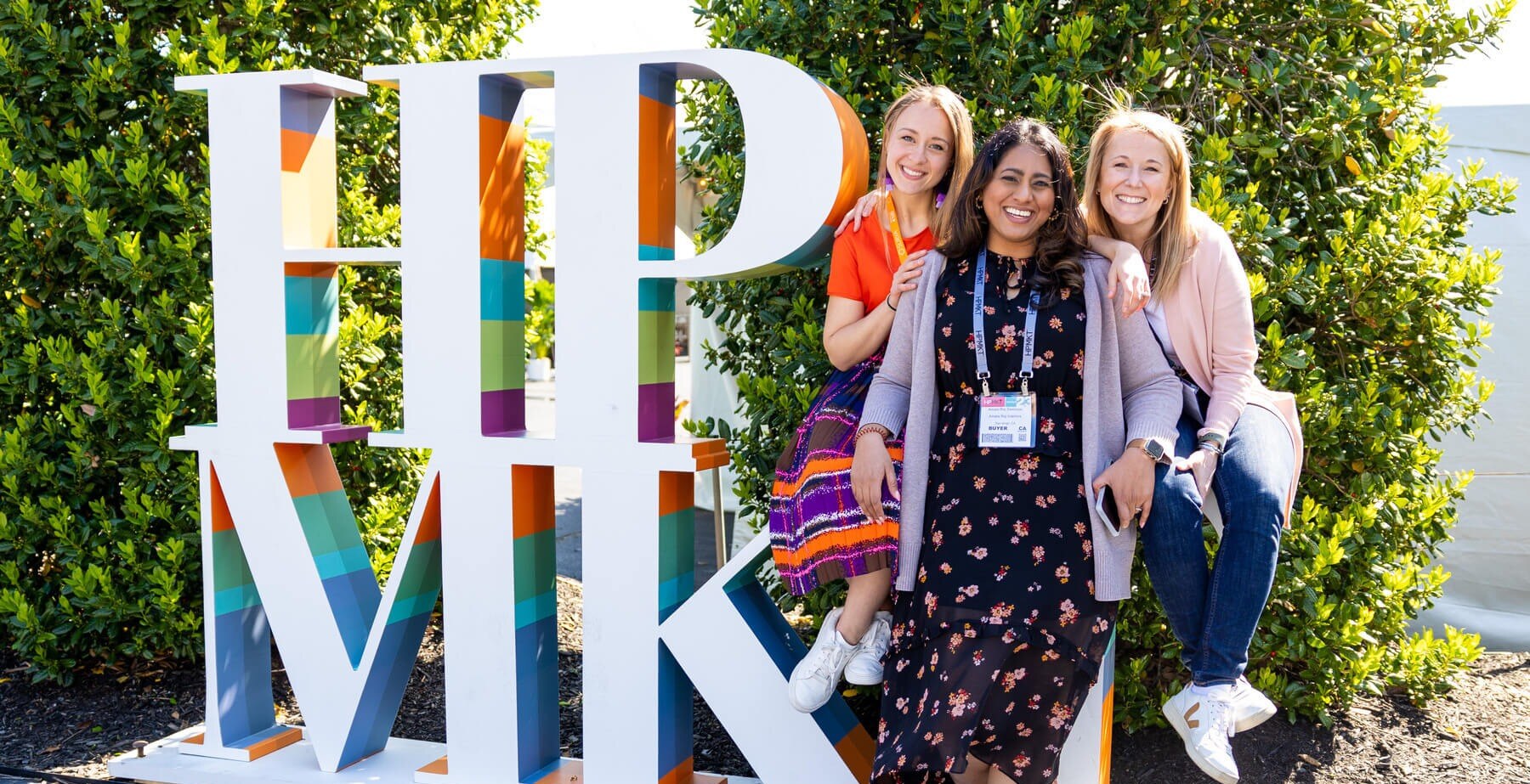 3 Friends in front of the High Point Market Sign